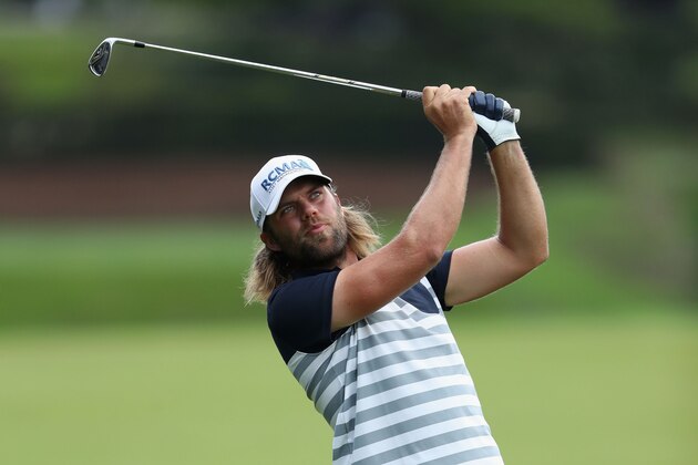 VIRGINIA WATER, ENGLAND - MAY 25:  Johan Carlsson of Sweden hits his second shot on the 9th hole during day one of the BMW PGA Championship at Wentworth on May 25, 2017 in Virginia Water, England.  (Photo by David Cannon/Getty Images)