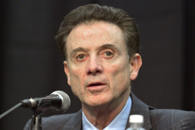 FILE - In a Friday, Feb. 5, 2016 file photo, Louisville head basketball coach Rick Pitino listens to a question during a press conference, in Louisville Ky. The NCAA accuses Louisville of providing impermissible benefits and breaches of conduct as a result of its investigation into an escort's book allegations that former men's basketball staffer Andre McGee hired her and other dancers for sex parties with Cardinals recruits and players. The NCAA sent its' Notice of Official Allegations to the school and released it on Thursday, Oct. 20, 2016. The governing body considers the breaches of conduct Level 1 infractions. The letter does not mention a lack of institutional control, considered the most serious violation, but says that Cardinals coach Rick Pitino failed to monitor McGee.  (AP Photo/Timothy D. Easley)