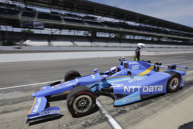 Scott Dixon, of New Zealand, pulls out of the pits during practice for the Indianapolis 500 IndyCar auto race at Indianapolis Motor Speedway, Monday, May 22, 2017 in Indianapolis. (AP Photo/Darron Cummings)