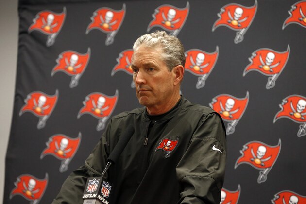 Tampa Bay Buccaneers head coach Dirk Koetter participates in a news conference after an NFL football game against the Dallas Cowboys on Sunday, Dec. 18, 2016, in Arlington, Texas. (AP Photo/Michael Ainsworth)