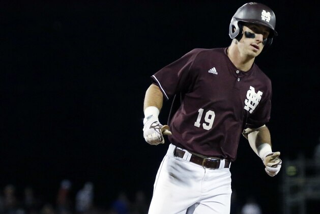 Mississippi State's Brent Rooker rounds third base during his three run home run trot against Mississippi in the fifth inning of the Governor's Cup in an NCAA college baseball game at Trustmark Park Stadium in Pearl, Miss., Tuesday, April 25, 2017. (AP Photo/Rogelio V. Solis)