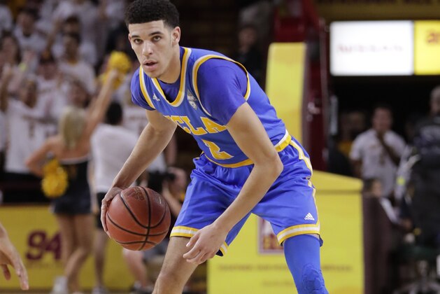 UCLA guard Lonzo Ball (2) looks to pass against Arizona State during the first half of an NCAA college basketball game, Thursday, Feb. 23, 2017, in Tempe, Ariz. (AP Photo/Matt York)