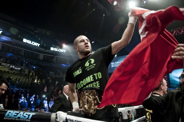 ISTANBUL, TURKEY - APRIL 12: Gohkan Saki waves a turkish flag after winning the Light Heavyweight World title on April 12, 2014 in Istanbul, Turkey. (Photo by Pedro Gomes/Getty Images)