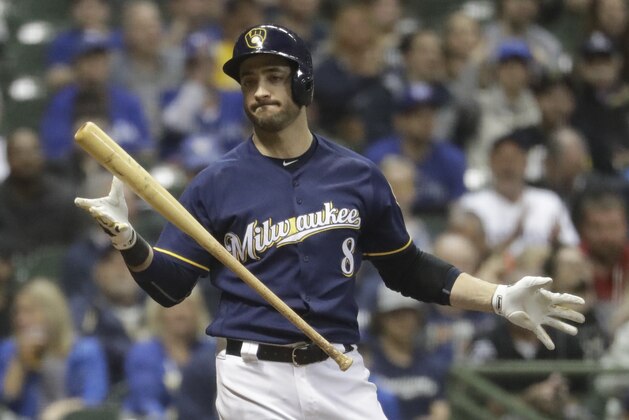 Milwaukee Brewers' Ryan Braun reacts after striking out with runners at second and third during the fifth inning of a baseball game against the Toronto Blue Jays Tuesday, May 23, 2017, in Milwaukee. (AP Photo/Morry Gash)