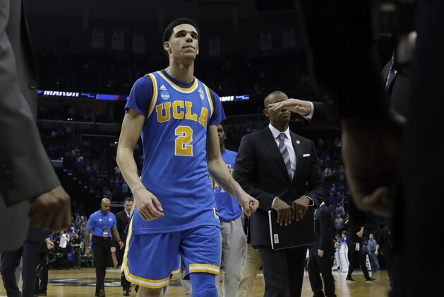 UCLA guard Lonzo Ball (2) leaves the court after UCLA lost to Kentucky in an NCAA college basketball tournament South Regional semifinal game Friday, March 24, 2017, in Memphis, Tenn. (AP Photo/Mark Humphrey)