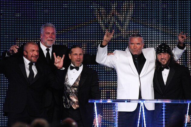 (left to right) Paul Levesque aka Triple H, Kevin Nash, Michael Shawn Hickenbottom aka Shawn Michaels, 2014 inductee Scott Hall aka Razor Ramon, and Sean Waltman aka X-Pac, are seen at the WWE Hall of Fame Induction at the Smoothie King Center in New Orleans on Saturday, April 5, 2014. (Jonathan Bachman/AP Images for WWE)