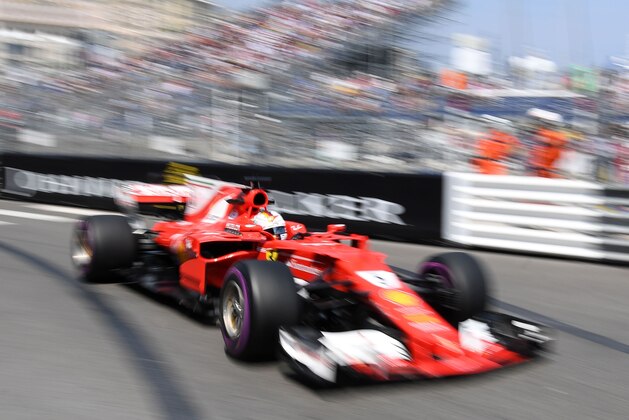 TOPSHOT - Ferrari's German driver Sebastian Vettel drives during the second practice session at the Monaco street circuit on May 25, 2017 in Monaco, three days ahead of the Monaco Formula 1 Grand Prix.  / AFP PHOTO / PASCAL GUYOT        (Photo credit should read PASCAL GUYOT/AFP/Getty Images)