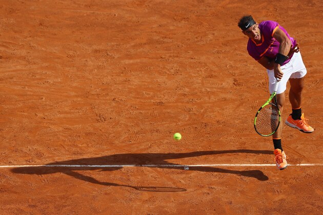 ROME, ITALY - MAY 19:  Rafael Nadal of Spain serves during the men's quarter-final match against Dominic Thiem of Austria on Day Six of the Internazionali BNL d'Italia 2017 at Foro Italico on May 19, 2017 in Rome, Italy.  (Photo by Michael Steele/Getty Images)
