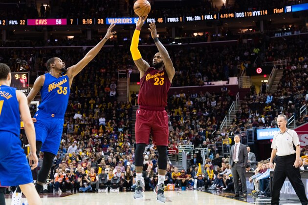 CLEVELAND, OH - DECEMBER 25: LeBron James #23 of the Cleveland Cavaliers shoots over Kevin Durant #35 of the Golden State Warriors during the second half at Quicken Loans Arena on December 25, 2016 in Cleveland, Ohio. The Cavaliers defeated the Warriors 109-108. NOTE TO USER: User expressly acknowledges and agrees that, by downloading and/or using this photograph, user is consenting to the terms and conditions of the Getty Images License Agreement. Mandatory copyright notice. (Photo by Jason Miller/Getty Images)