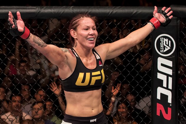 BRASILIA, BRAZIL - SEPTEMBER 24: Cris Cyborg of Brazil celebrates victory over Lina Lansberg of Sweden in their catchweight UFC bout during the UFC Fight Night event at Nilson Nelson gymnasium on September 24, 2016 in Brasilia, Brazil. (Photo by Buda Mendes/Zuffa LLC/Zuffa LLC via Getty Images)