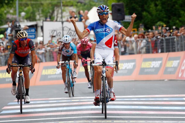 French cyclist Thibaut Pinot of Team FDJ crosses the finish line and wins the 20th stage of 100th Giro d'Italia, Tour of Italy, from Pordenone to Asiago of 190 km on May 27, 2017 in Asiago.  / AFP PHOTO / Luk BENIES        (Photo credit should read LUK BENIES/AFP/Getty Images)