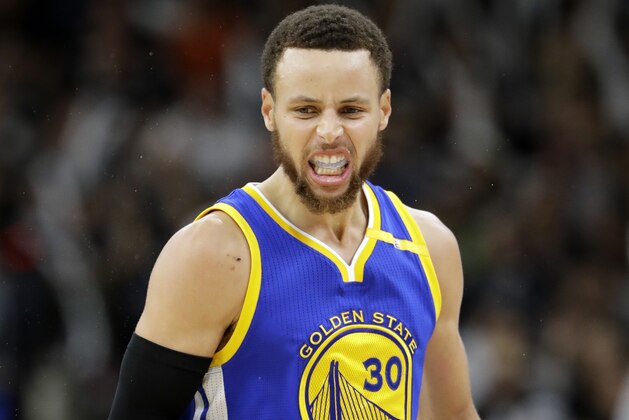 Golden State Warriors guard Stephen Curry (30) celebrates a basket against the San Antonio Spurs during the second half in Game 4 of the NBA basketball Western Conference finals, Monday, May 22, 2017, in San Antonio. (AP Photo/Eric Gay)