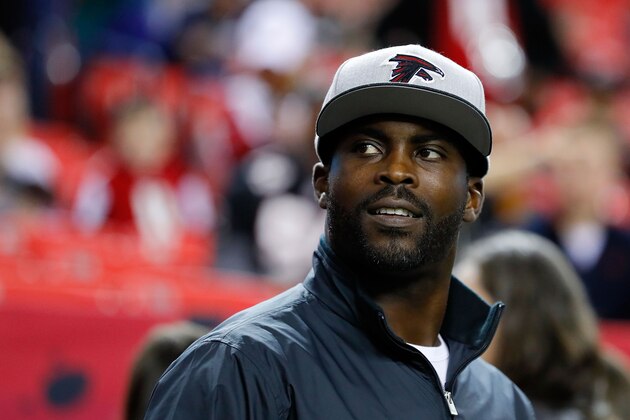 ATLANTA, GA - JANUARY 01: Former Atlanta Falcons player Michael Vick walks on the field prior to the game against the New Orleans Saints at the Georgia Dome on January 1, 2017 in Atlanta, Georgia. (Photo by Kevin C.  Cox/Getty Images)