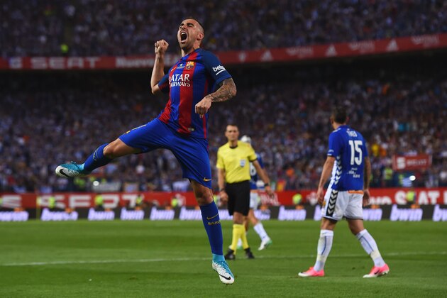 Barcelona's forward Paco Alcacer celebrates after scoring during the Spanish Copa del Rey (King's Cup) final football match FC Barcelona vs Deportivo Alaves at the Vicente Calderon stadium in Madrid on May 27, 2017. / AFP PHOTO / Josep LAGO        (Photo credit should read JOSEP LAGO/AFP/Getty Images)