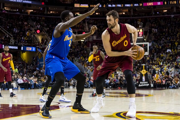 CLEVELAND, OH - DECEMBER 25: Draymond Green #23 of the Golden State Warriors puts pressure on Kevin Love #0 of the Cleveland Cavaliers during the second half at Quicken Loans Arena on December 25, 2016 in Cleveland, Ohio. The Cavaliers defeated the Warriors 109-108. NOTE TO USER: User expressly acknowledges and agrees that, by downloading and/or using this photograph, user is consenting to the terms and conditions of the Getty Images License Agreement. Mandatory copyright notice. (Photo by Jason Miller/Getty Images)