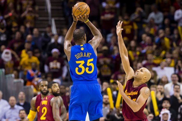 CLEVELAND, OH - DECEMBER 25: Kevin Durant #35 of the Golden State Warriors shoots over Richard Jefferson #24 of the Cleveland Cavaliers during the second half at Quicken Loans Arena on December 25, 2016 in Cleveland, Ohio. The Cavaliers defeated the Warriors 109-108. NOTE TO USER: User expressly acknowledges and agrees that, by downloading and/or using this photograph, user is consenting to the terms and conditions of the Getty Images License Agreement. Mandatory copyright notice. (Photo by Jason Miller/Getty Images)