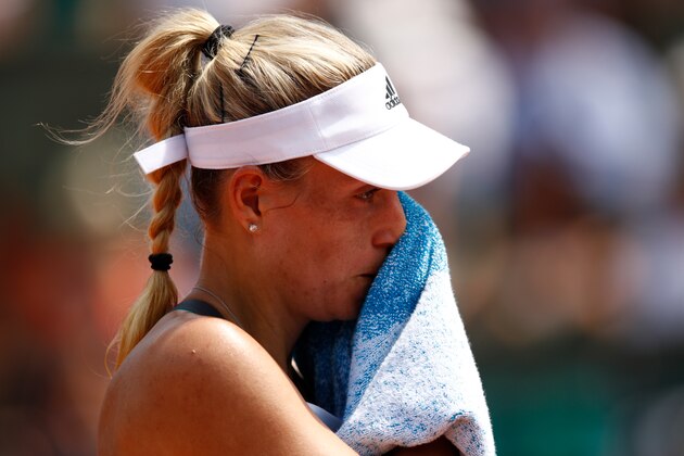 PARIS, FRANCE - MAY 28:  Angelique Kerber of Germany reacts during the ladies singles first round match against Ekaterina Makarova of Russia on day one of the 2017 French Open at Roland Garros on May 28, 2017 in Paris, France.  (Photo by Adam Pretty/Getty Images)
