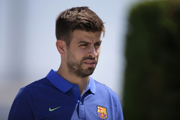 FC Barcelona's Gerard Pique arrives for a press conference at the Sports Center FC Barcelona Joan Gamper in Sant Joan Despi, Spain, Friday, May 26, 2017. FC Barcelona will play against Alaves in the Spanish Copa del Rey soccer final on Saturday. (AP Photo/Manu Fernandez)