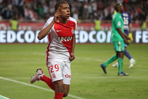 MONACO, MONACO - MAY 17: Kylian Mbappe of Monaco celebrates his goal during the French Ligue 1 match between AS Monaco and AS Saint-Etienne (ASSE) at Stade Louis II on May 17, 2017 in Monaco, Monaco. (Photo by Jean Catuffe/Getty Images)
