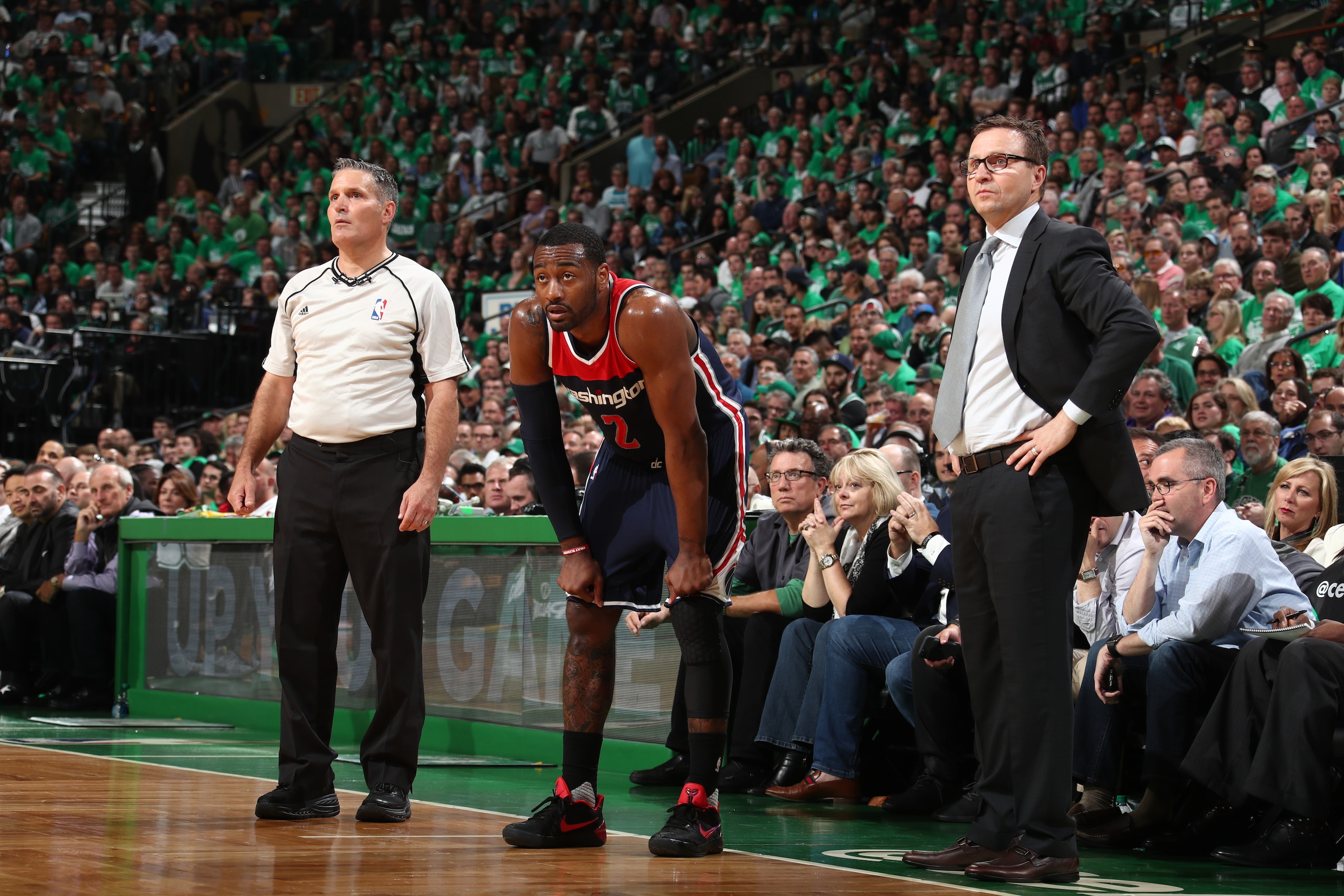 BOSTON, MA -  MAY 15:  John Wall #2 and Head Coach Scott Brooks of the Washington Wizards look on during Game Seven of the Eastern Conference Semifinals of the 2017 NBA Playoffs on May 15, 2017 at TD Garden in BOSTON, MA. NOTE TO USER: User expressly acknowledges and agrees that, by downloading and or using this Photograph, user is consenting to the terms and conditions of the Getty Images License Agreement. Mandatory Copyright Notice: Copyright 2017 NBAE (Photo by Nathaniel S. Butler/NBAE via Getty Images)