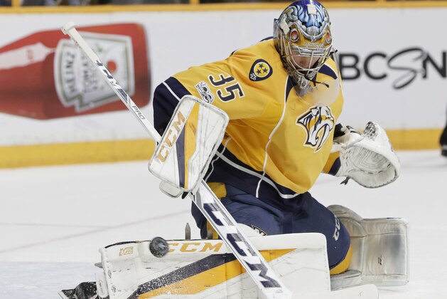 Nashville Predators goalie Pekka Rinne (35), of Finland, stops a shot against the Anaheim Ducks during the first period in Game 6 of the Western Conference final in the NHL hockey Stanley Cup playoffs Monday, May 22, 2017, in Nashville, Tenn. (AP Photo/Mark Humphrey)