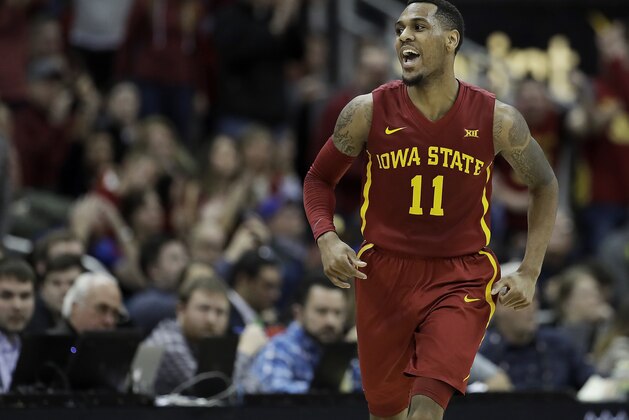 Iowa State's Monte Morris celebrates after making a basket during the first half of the team's NCAA college basketball game against West Virginia for the championship of the Big 12 tournament in Kansas City, Mo., Saturday, March 11, 2017. (AP Photo/Charlie Riedel)
