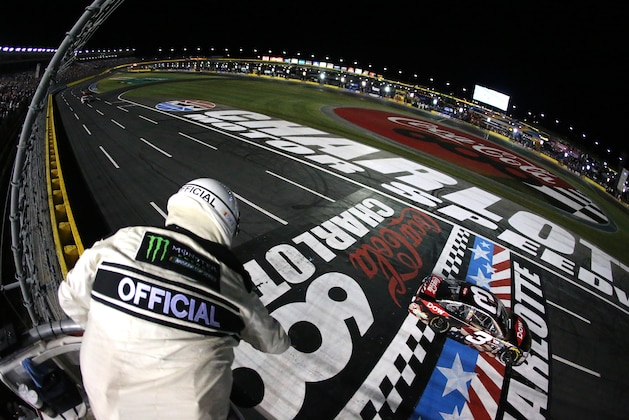 CHARLOTTE, NC - MAY 28:  Austin Dillon, driver of the #3 DOW Salutes Veterans Chevrolet, takes the checkered flag to win the Monster Energy NASCAR Cup Series Coca-Cola 600 at Charlotte Motor Speedway on May 28, 2017 in Charlotte, North Carolina.  (Photo by Jerry Markland/Getty Images)