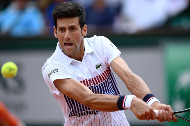 Serbia's Novak Djokovic returns the ball to Spain's Marcel Granollers during their tennis match at the Roland Garros 2017 French Open on May 29, 2017 in Paris.  / AFP PHOTO / GABRIEL BOUYS        (Photo credit should read GABRIEL BOUYS/AFP/Getty Images)