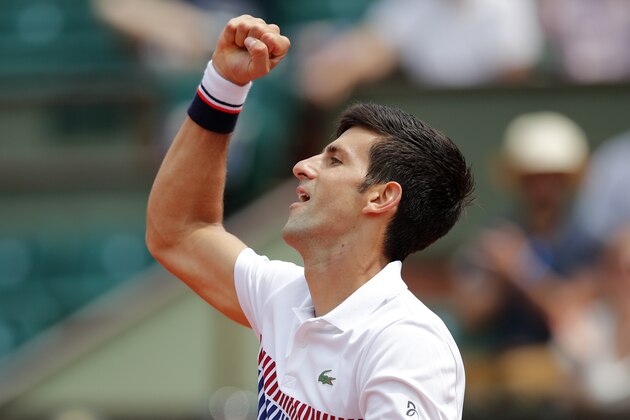 Serbia's Novak Djokovic clenches his fist after scoring a point against Spain's Marcel Granollers during their first round match of the French Open tennis tournament at the Roland Garros stadium, in Paris, France. Monday, May 29, 2017. (AP Photo/Christophe Ena)