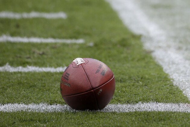 A football is shown next to a Salute to Service symbol on an end zone pylon before an NFL football game between the San Francisco 49ers and the Atlanta Falcons in Santa Clara, Calif., Sunday, Nov. 8, 2015. (AP Photo/Marcio Jose Sanchez)