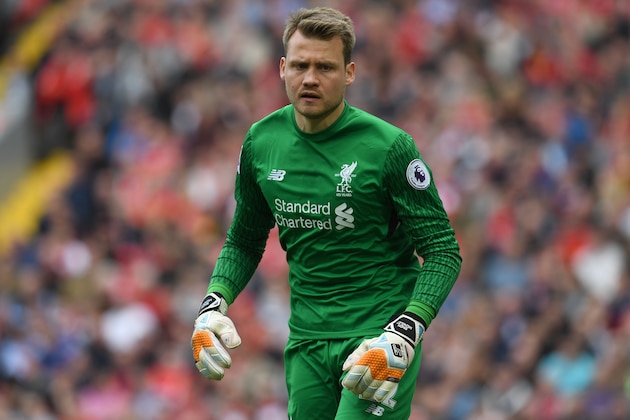 Liverpool's Belgian goalkeeper Simon Mignolet reacts during the English Premier League football match between Liverpool and Middlesbrough at Anfield in Liverpool, north west England on May 21, 2017. / AFP PHOTO / Paul ELLIS / RESTRICTED TO EDITORIAL USE. No use with unauthorized audio, video, data, fixture lists, club/league logos or 'live' services. Online in-match use limited to 75 images, no video emulation. No use in betting, games or single club/league/player publications.  /         (Photo credit should read PAUL ELLIS/AFP/Getty Images)