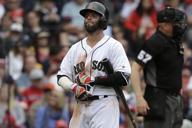 Boston Red Sox's Dustin Pedroia walks to the dugout after he struck out swinging off a pitch by Seattle Mariners' Edwin Diaz in the ninth inning of a baseball game, Sunday, May 28, 2017, in Boston. The Mariners shut out the Red Sox 5-0. (AP Photo/Steven Senne)
