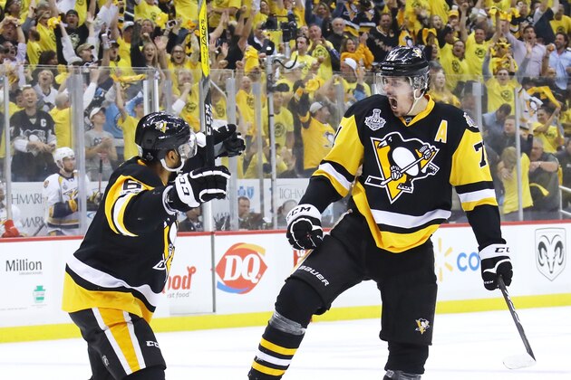 PITTSBURGH, PA - MAY 29:  Evgeni Malkin #71 of the Pittsburgh Penguins celebrates with Trevor Daley #6 after scoring a goal during the first period in Game One of the 2017 NHL Stanley Cup Final against the Nashville Predators at PPG Paints Arena on May 29, 2017 in Pittsburgh, Pennsylvania.  (Photo by Bruce Bennett/Getty Images)