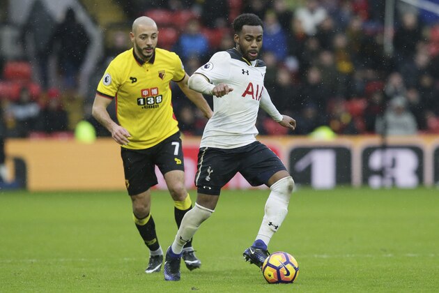 Tottenham's Danny Rose, right, competes for the ball with Watford's Nordin Amrabat during the English Premier League soccer match between Watford and Tottenham Hotspur at the Vicarage Road Stadium in Watford, England Sunday Jan. 1, 2017. (AP Photo/Tim Ireland)