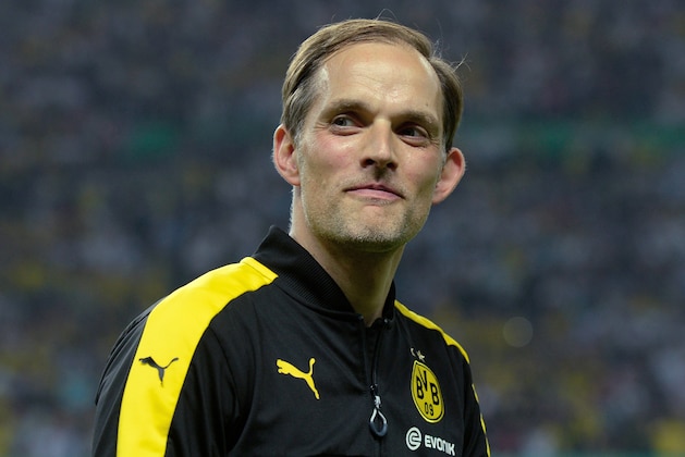 Dortmund's head coach Thomas Tuchel smiles after the German Cup (DFB Pokal) final football match Eintracht Frankfurt v BVB Borussia Dortmund at the Olympic stadium in Berlin on May 27, 2017. / AFP PHOTO / Christof STACHE / RESTRICTIONS: ACCORDING TO DFB RULES IMAGE SEQUENCES TO SIMULATE VIDEO IS NOT ALLOWED DURING MATCH TIME. MOBILE (MMS) USE IS NOT ALLOWED DURING AND FOR FURTHER TWO HOURS AFTER THE MATCH. == RESTRICTED TO EDITORIAL USE == FOR MORE INFORMATION CONTACT DFB DIRECTLY AT +49 69 67880

 /         (Photo credit should read CHRISTOF STACHE/AFP/Getty Images)
