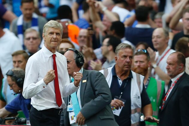 Arsenal's French manager Arsene Wenger celebrates at the final whistle in the English FA Cup final football match between Arsenal and Chelsea at Wembley stadium in London on May 27, 2017.
Aaron Ramsey scored a 79th-minute header to earn Arsenal a stunning 2-1 win over Double-chasing Chelsea on Saturday and deliver embattled manager Arsene Wenger a record seventh FA Cup. / AFP PHOTO / Ian KINGTON / NOT FOR MARKETING OR ADVERTISING USE / RESTRICTED TO EDITORIAL USE        (Photo credit should read IAN KINGTON/AFP/Getty Images)