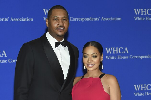 FILE - In this April 30, 2016, file photo, Carmelo Anthony, left, and La La Anthony arrive at the White House Correspondents' Association Dinner at the Washington Hilton Hotel in Washington. Anthony's concerns go beyond his future with the New York Knicks. The All-Star forward and his wife, actress La La Anthony, are separated, according to a report from TMZ . The website says she moved out of the family's home last week and has her own place in New York.  (Photo by Evan Agostini/Invision/AP, File)