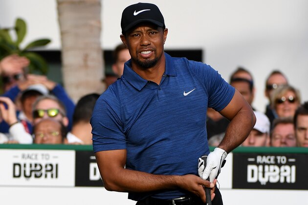 DUBAI, UNITED ARAB EMIRATES - FEBRUARY 02:  Tiger Woods o f the USA watches his tee shot on the 1st tee during the first round of the Omega Dubai Desert Classic at Emirates Golf Club on February 2, 2017 in Dubai, United Arab Emirates.  (Photo by Ross Kinnaird/Getty Images)