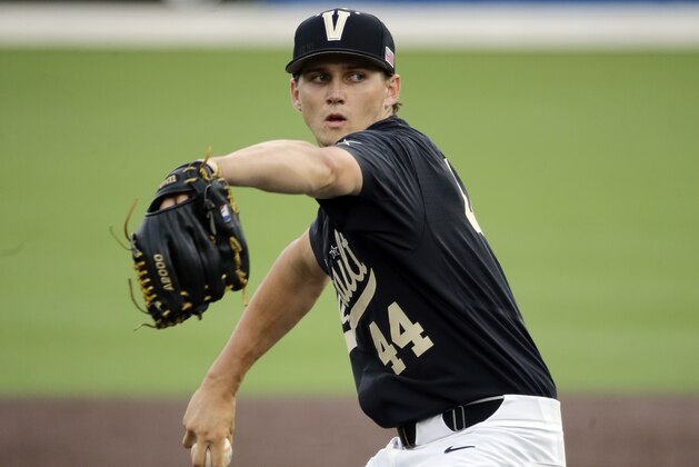 Vanderbilt starter Kyle Wright pitches against Washington in the first inning of an NCAA college baseball regional tournament game Saturday, June 4, 2016, in Nashville, Tenn. (AP Photo/Mark Humphrey)