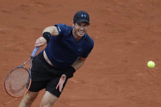 Britain's Andy Murray serves the ball to Russia's Andrey Kuznetsov during their tennis match at the Roland Garros 2017 French Open on May 30, 2017 in Paris.  / AFP PHOTO / Thomas SAMSON        (Photo credit should read THOMAS SAMSON/AFP/Getty Images)