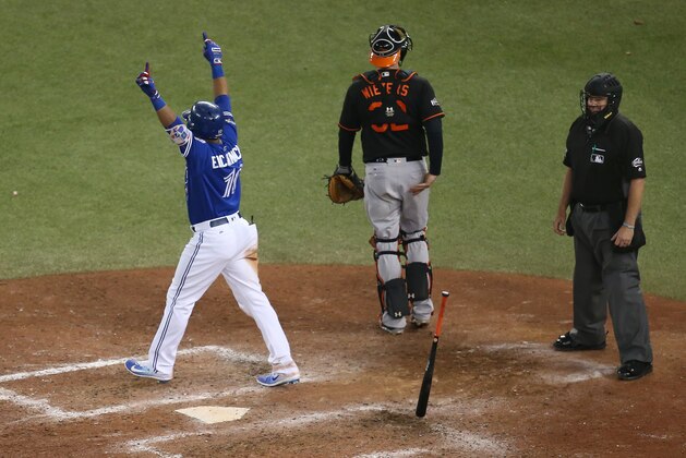 TORONTO, ON - OCTOBER 04: Edwin Encarnacion #10 of the Toronto Blue Jays reacts after hitting a three-run walk-off home run in the eleventh inning to defeat the Baltimore Orioles 5-2 in the American League Wild Card game at Rogers Centre on October 4, 2016 in Toronto, Canada. (Photo by Tom Szczerbowski/Getty Images)