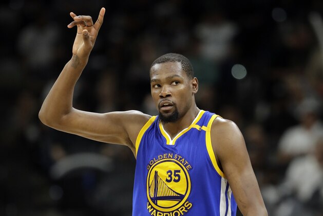 Golden State Warriors' Kevin Durant (35) celebrates a basket against the San Antonio Spurs during the second half in Game 4 of the NBA basketball Western Conference finals, Monday, May 22, 2017, in San Antonio. (AP Photo/Eric Gay)