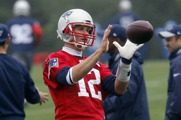 New England Patriots quarterback Tom Brady catches the ball during NFL football organized team activities Thursday, May 25, 2017, in Foxborough, Mass. (AP Photo/Bill Sikes)