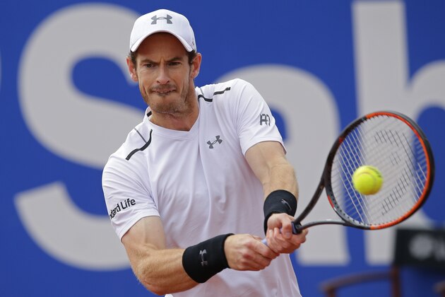 Andy Murray of Britain returns the ball to Feliciano Lopez of Spain during the Barcelona Open Tennis Tournament in Barcelona, Spain, Thursday, April 27, 2017. (AP Photo/Manu Fernandez)