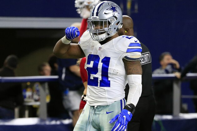 Dallas Cowboys running back Ezekiel Elliott (21) gestures after a long run late in the second half of an NFL football game against the Tampa Bay Buccaneers on Sunday, Dec. 18, 2016, in Arlington, Texas. (AP Photo/Ron Jenkins)