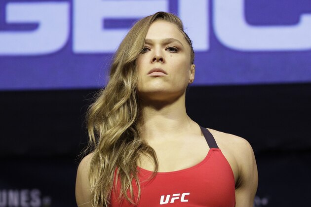 Ronda Rousey stands on stage during an event for UFC 207, Thursday, Dec. 29, 2016, in Las Vegas. Rousey is scheduled to fight Amanda Nunes in a mixed martial arts women's bantamweight championship bout Saturday in Las Vegas. (AP Photo/John Locher)