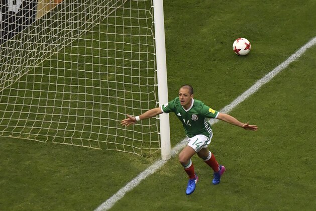 CORRECTION - Mexico's Javier Hernandez celebrates after scoring against Costa Rica during their 2018 FIFA World Cup qualifier football match in Mexico City on March 24, 2017. / AFP PHOTO / YURI CORTEZ / The erroneous mention appearing in the metadata of this photo by YURI CORTEZ has been modified in AFP systems in the following manner: [Javier Hernandez] instead of [Andres Guardado]. Please immediately remove the erroneous mention[s] from all your online services and delete it (them) from your servers. If you have been authorized by AFP to distribute it (them) to third parties, please ensure that the same actions are carried out by them. Failure to promptly comply with these instructions will entail liability on your part for any continued or post notification usage. Therefore we thank you very much for all your attention and prompt action. We are sorry for the inconvenience this notification may cause and remain at your disposal for any further information you may require.        (Photo credit should read YU