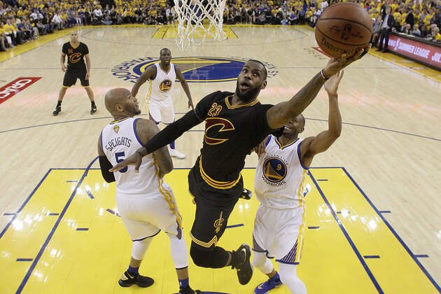 Cleveland Cavaliers forward LeBron James (23) shoots against the Golden State Warriors during the first half of Game 7 of basketball's NBA Finals in Oakland, Calif., Sunday, June 19, 2016. (AP Photo/Marcio Jose Sanchez, Pool)