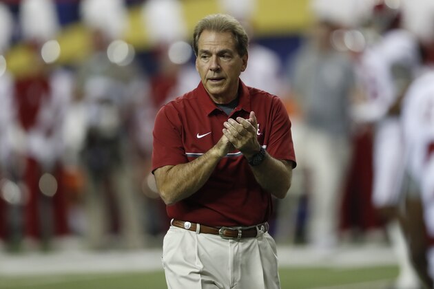 Alabama head coach Nick Saban watches his team warm up before the first half of the Southeastern Conference championship NCAA college football game between Alabama and Florida, Saturday, Dec. 3, 2016, in Atlanta.(AP Photo/John Bazemore)