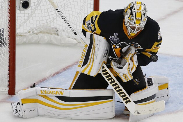 Pittsburgh Penguins' goalie Matt Murray makes a save against the Nashville Predators during the third period in Game 1 of the NHL hockey Stanley Cup Finals, Monday, May 29, 2017, in Pittsburgh. (AP Photo/Gene J. Puskar)